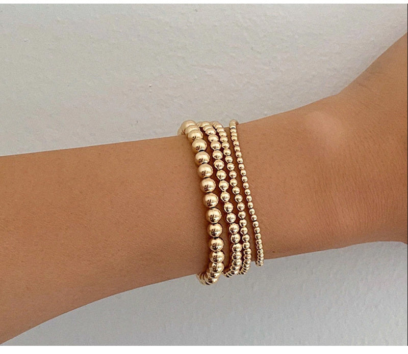 1 Piece 14K Plated Beaded Stackable Stretch Bracelet - Adjustable, Handcrafted, Dainty Jewelry for Women and Girls - Perfect for Everyday Wear and Gift Giving