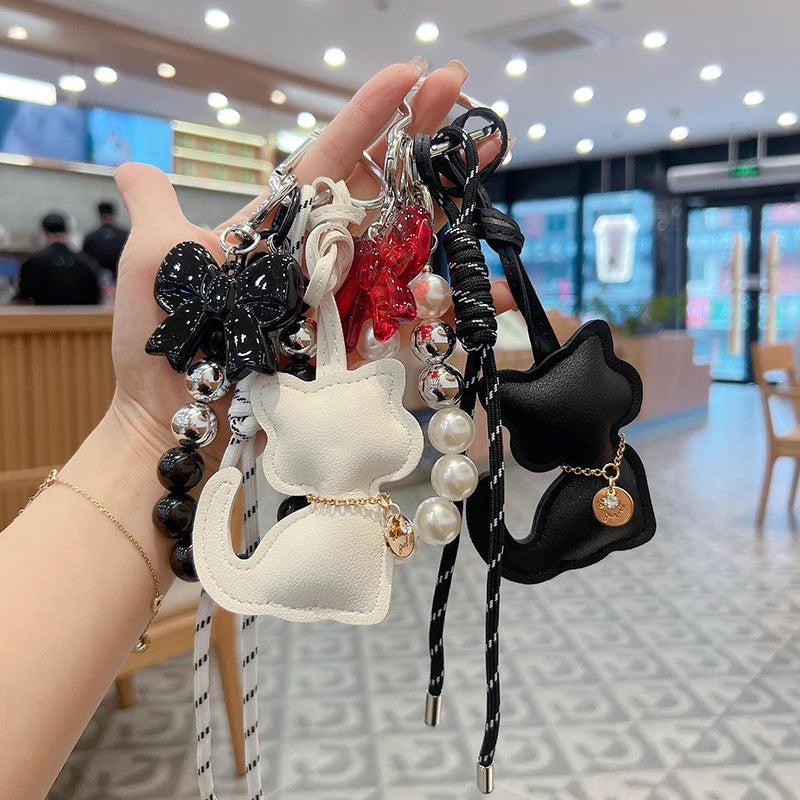 Bag Charms Purse Charms kit Keychains for Women,Cute Leather Cat Pearl bowknot Keychain Bag Charm for Handbag Accessories Tready