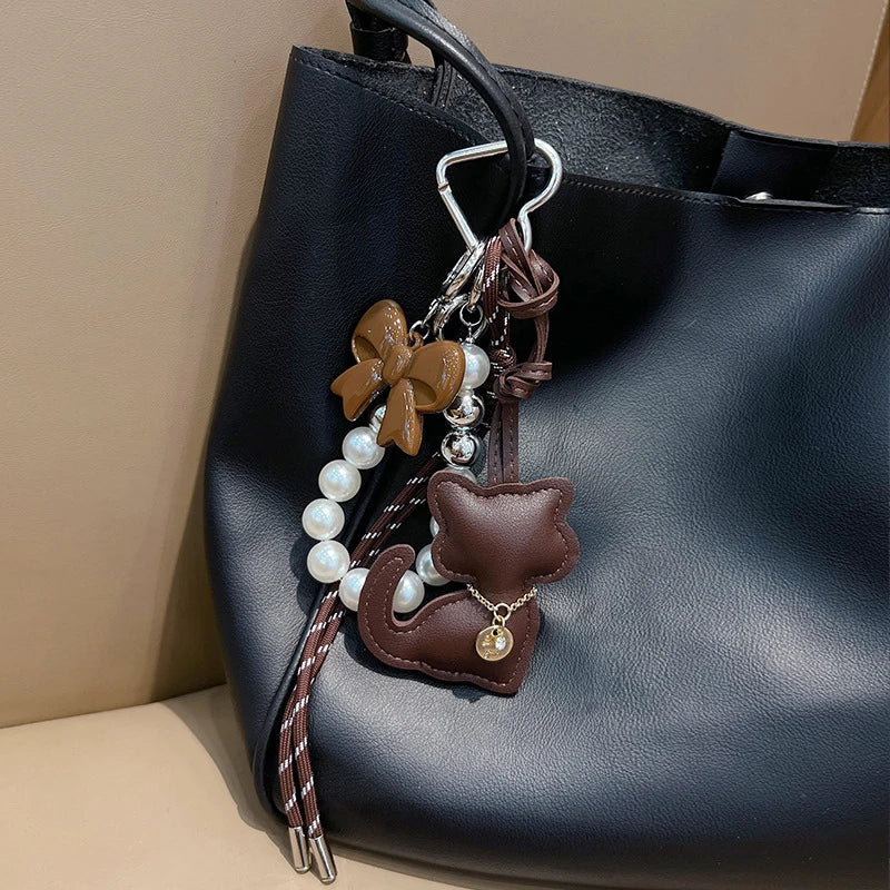 Bag Charms Purse Charms kit Keychains for Women,Cute Leather Cat Pearl bowknot Keychain Bag Charm for Handbag Accessories Tready
