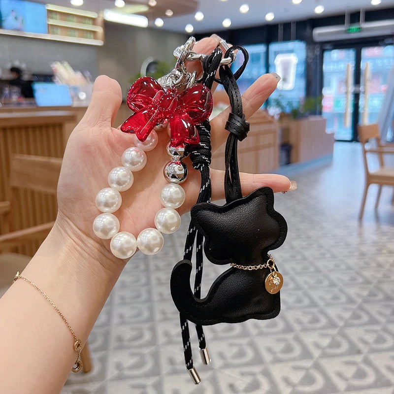 Bag Charms Purse Charms kit Keychains for Women,Cute Leather Cat Pearl bowknot Keychain Bag Charm for Handbag Accessories Tready