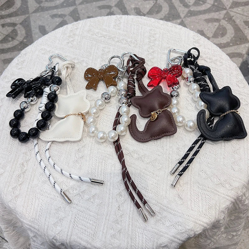Bag Charms Purse Charms kit Keychains for Women,Cute Leather Cat Pearl bowknot Keychain Bag Charm for Handbag Accessories Tready